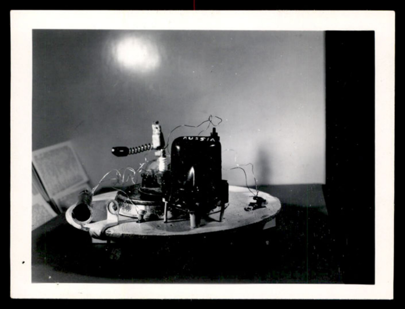 Side view of the constructed disc-shaped object, with a component labeled 'RUSSIA'.